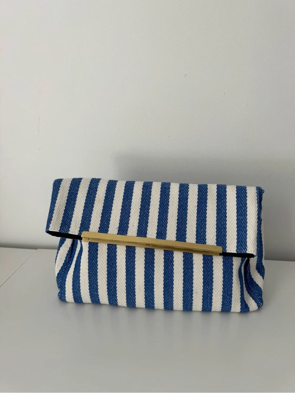 ASOS Blue and White Striped Fold-Over Clutch with Gold Bar